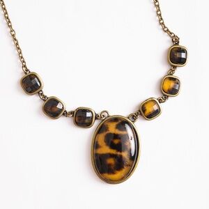 Choker length necklace leopard print pendant and stones antique gold look Cato